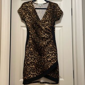 Stunning & sexy leopard dress sz L.